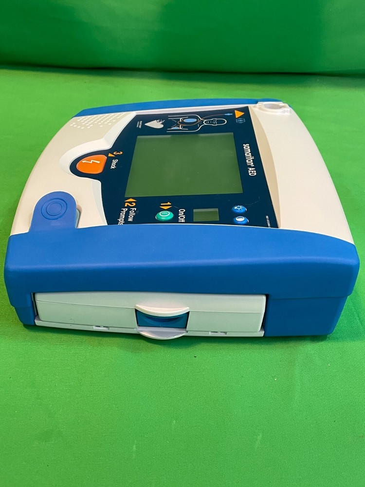 HEARTSINE Samaritan AED with accessories shown *battery dead* (H2-E)