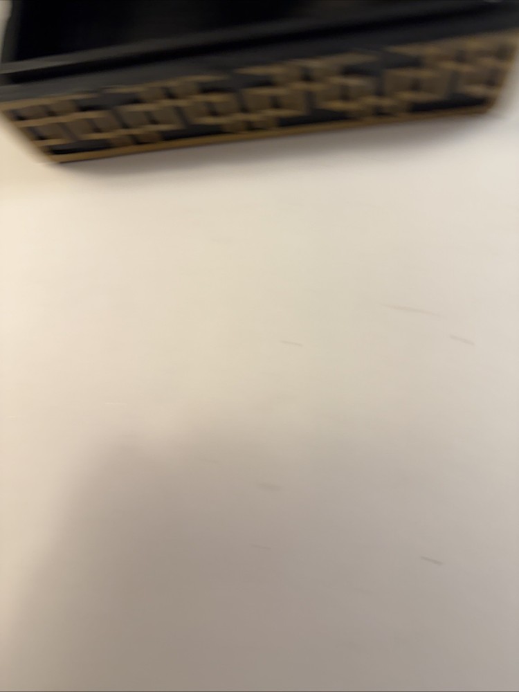 A decorative box with geometric inlay pattern, sold by Sears.