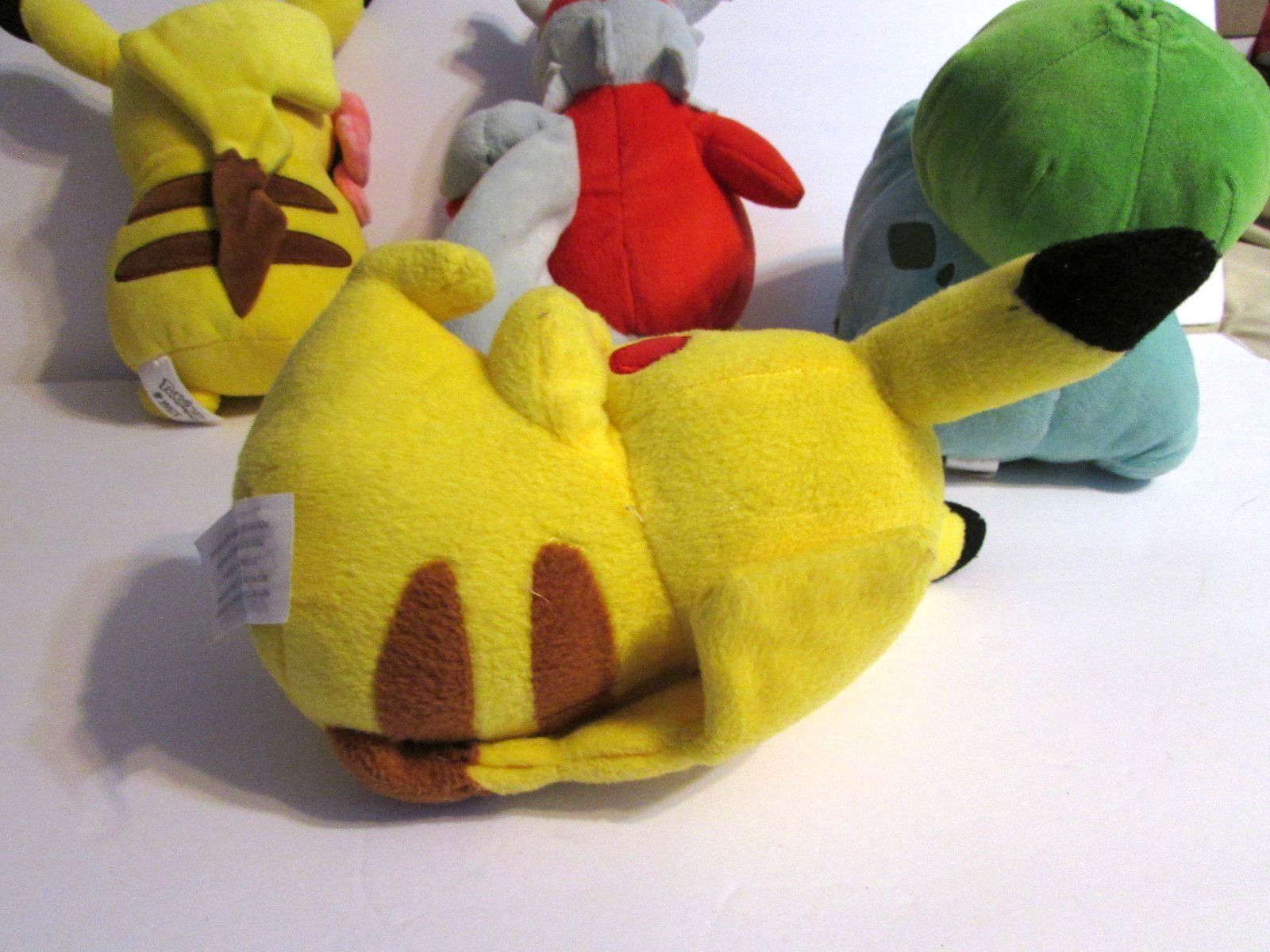Lot Of 4 Pokemon Plush Pikachu W/Flower Delibird Bulbasaur