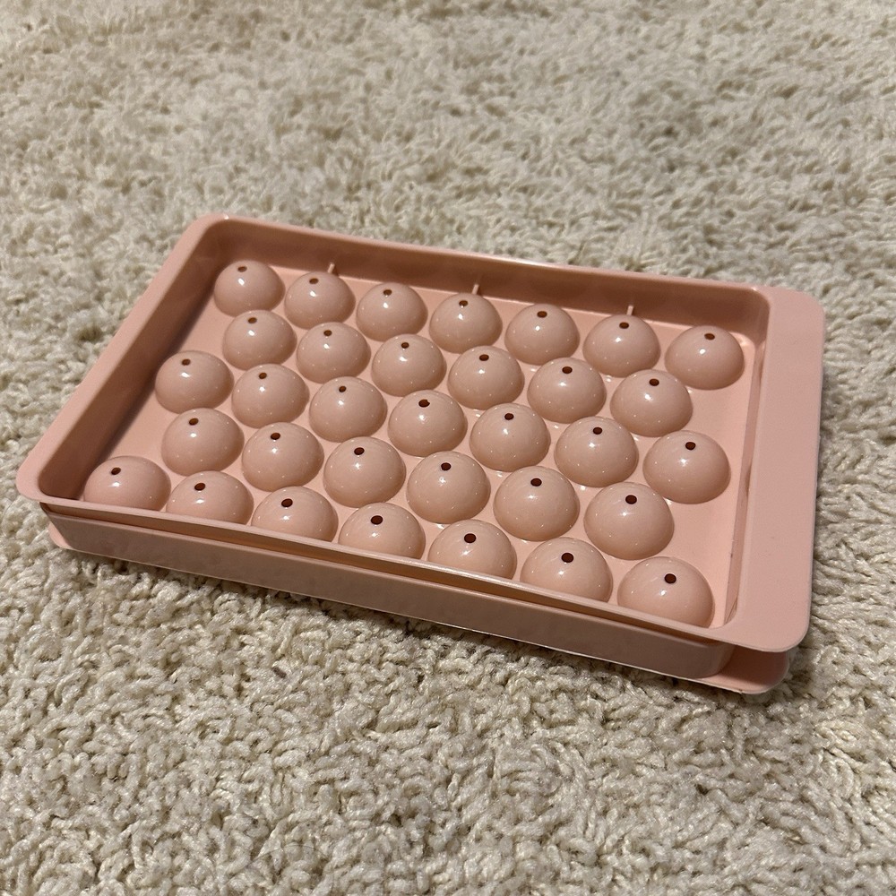 Round plastic ice cube mold light pink