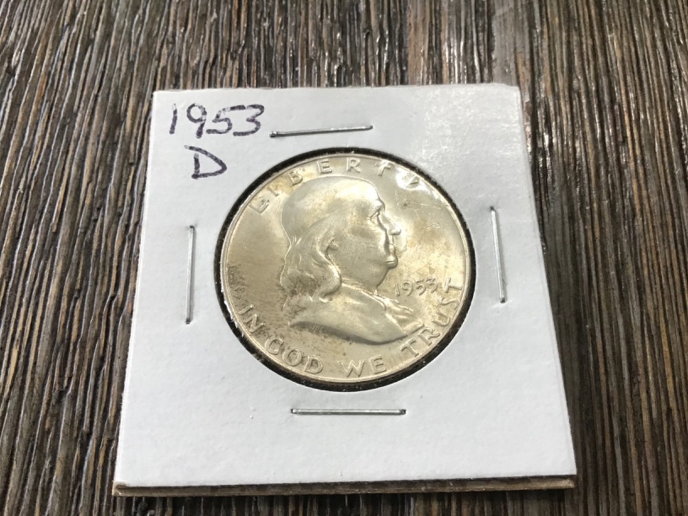 1953 s silver Franklin half dollar.