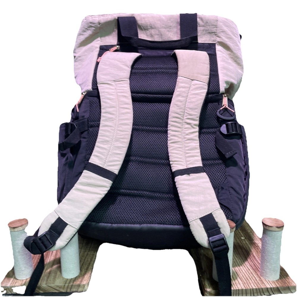 This is a Coleman soft-sided backpack cooler.