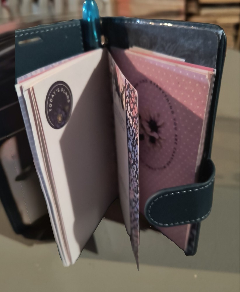 Handmade mini altered phone case journal