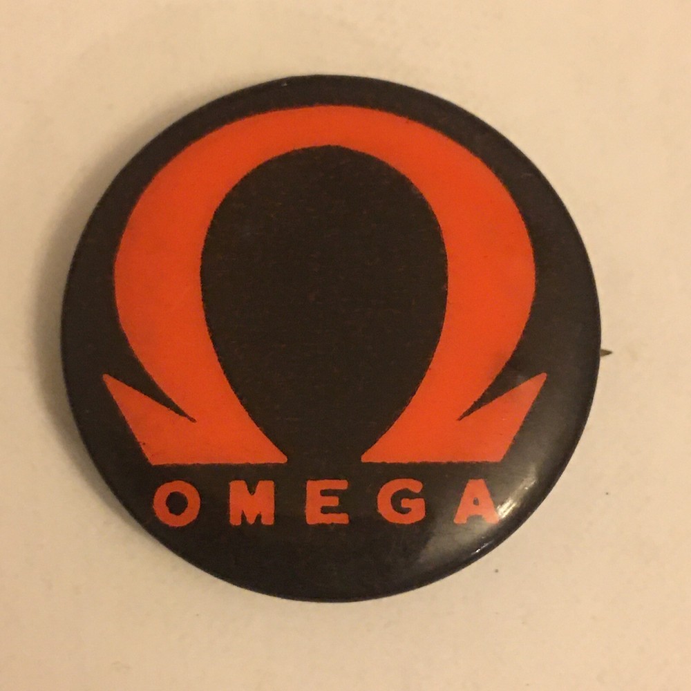 XIOM Omega pinback