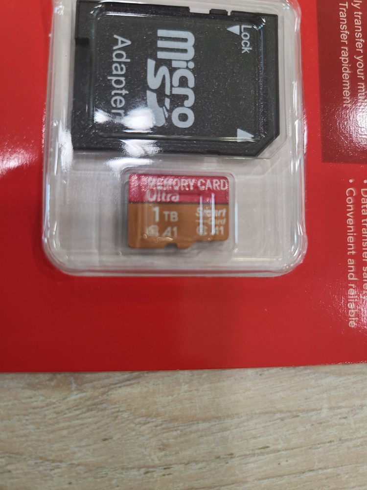 1 Tb micro SD memory card with adapter.