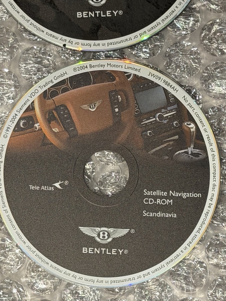 2004 Bentley Continental GT 7 Navigation Disc Set & Bentley Disc Case.