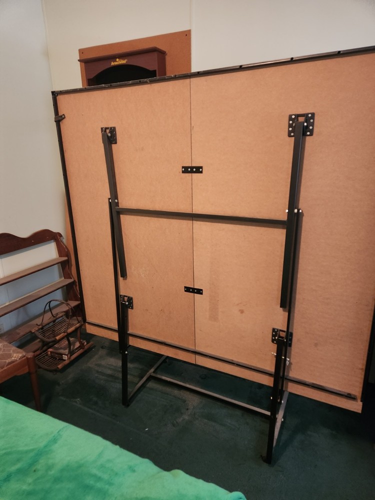 ping pong table and dart cabinet