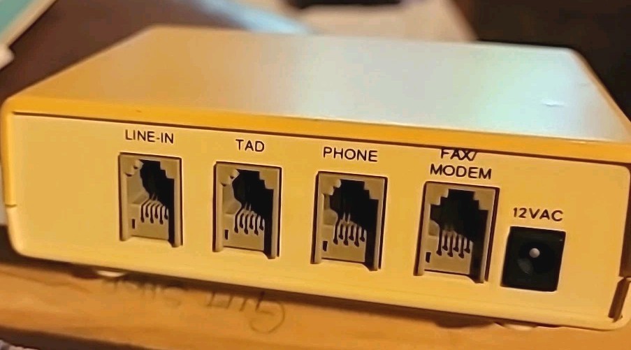 ComSwitch 300 Telephone Line Sharing Device, Command Communications