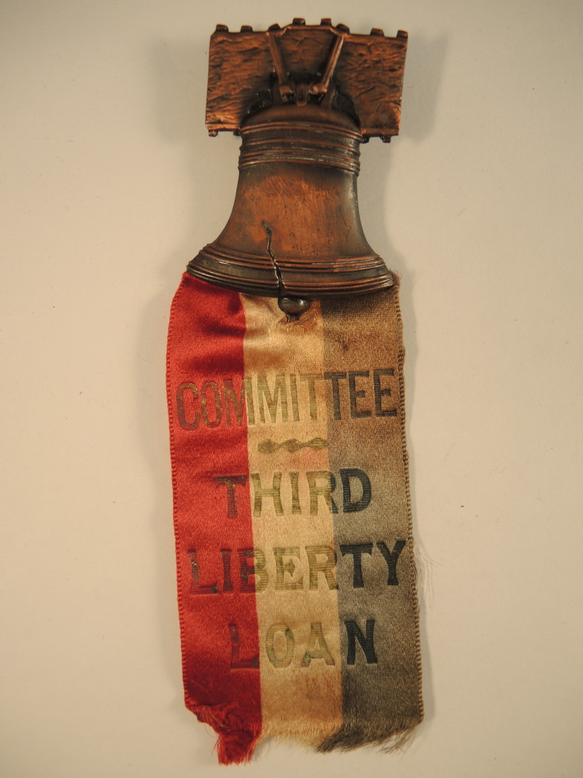 Liberty loan committee third liberty loan bell badge & ribbon pin WW I