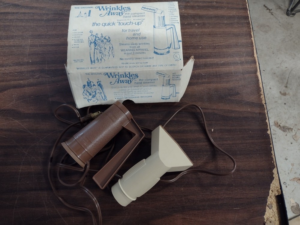 Vintage hand steamer