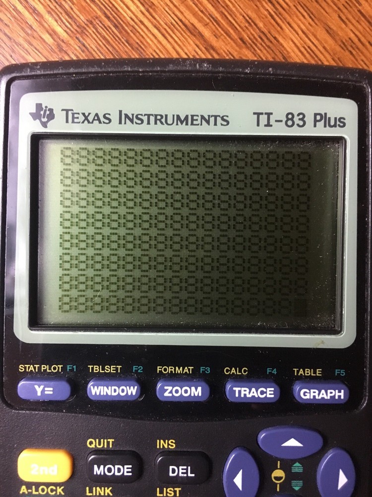 Texas Instruments TI-83 Plus Graphing Calculator - Good Condition.