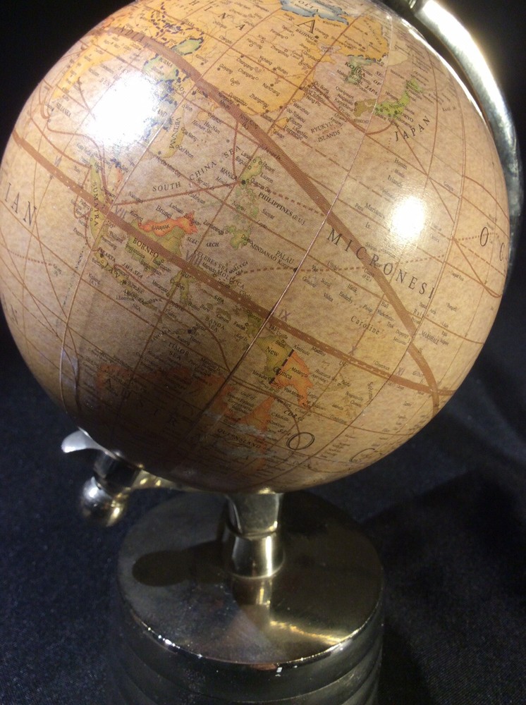 Globe On Silver Toned Base