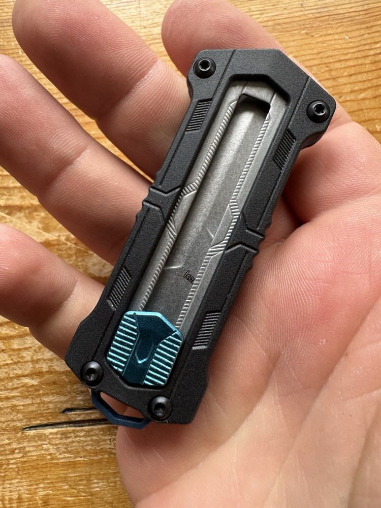 Kershaw Kapsule Manual Open Sliding Button Lock Single Edge Spear Point Blade