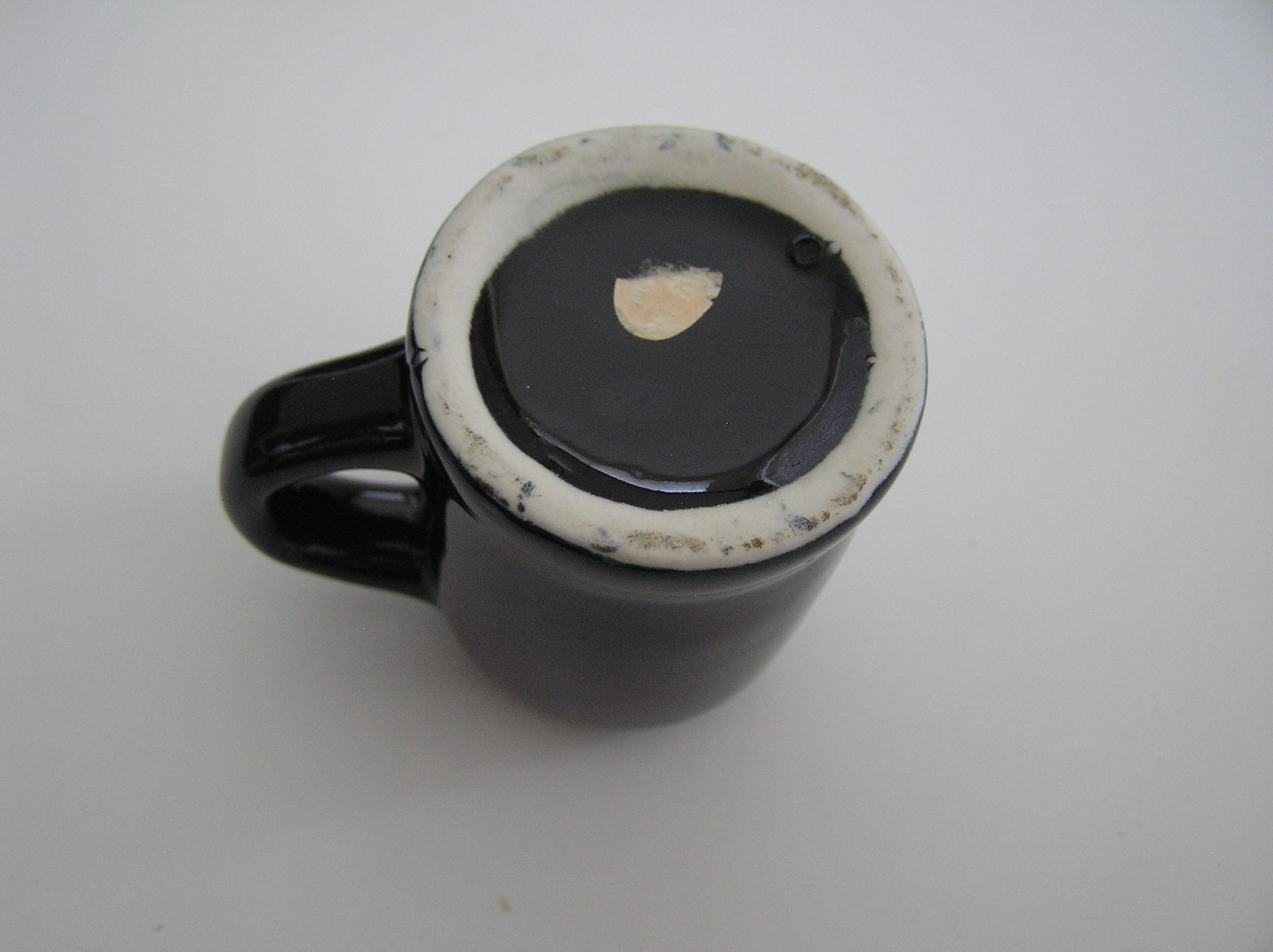 2 Souvenirs Shot Mugs: A Black Rumple Minze and A Clear Nashville 5cents Beer