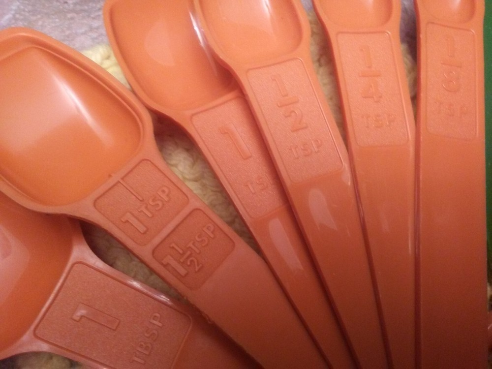 vintage Tupperware measuring spoons burnt orange