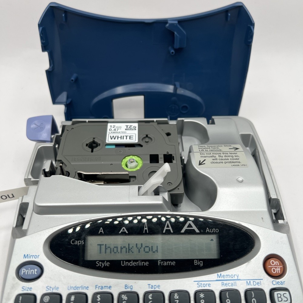 Brother P Touch Model PT-1750 battery powered Label Maker with labels
