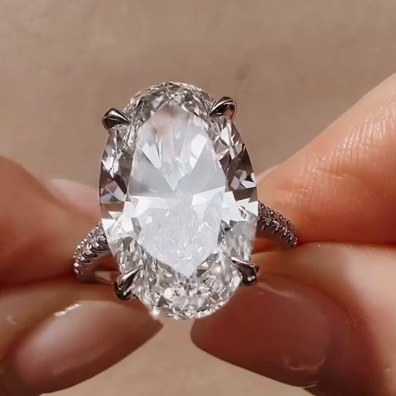 6.3 TCW Oval Cut Moissanite Hidden Halo Engagement Ring In 14k White Gold Plated