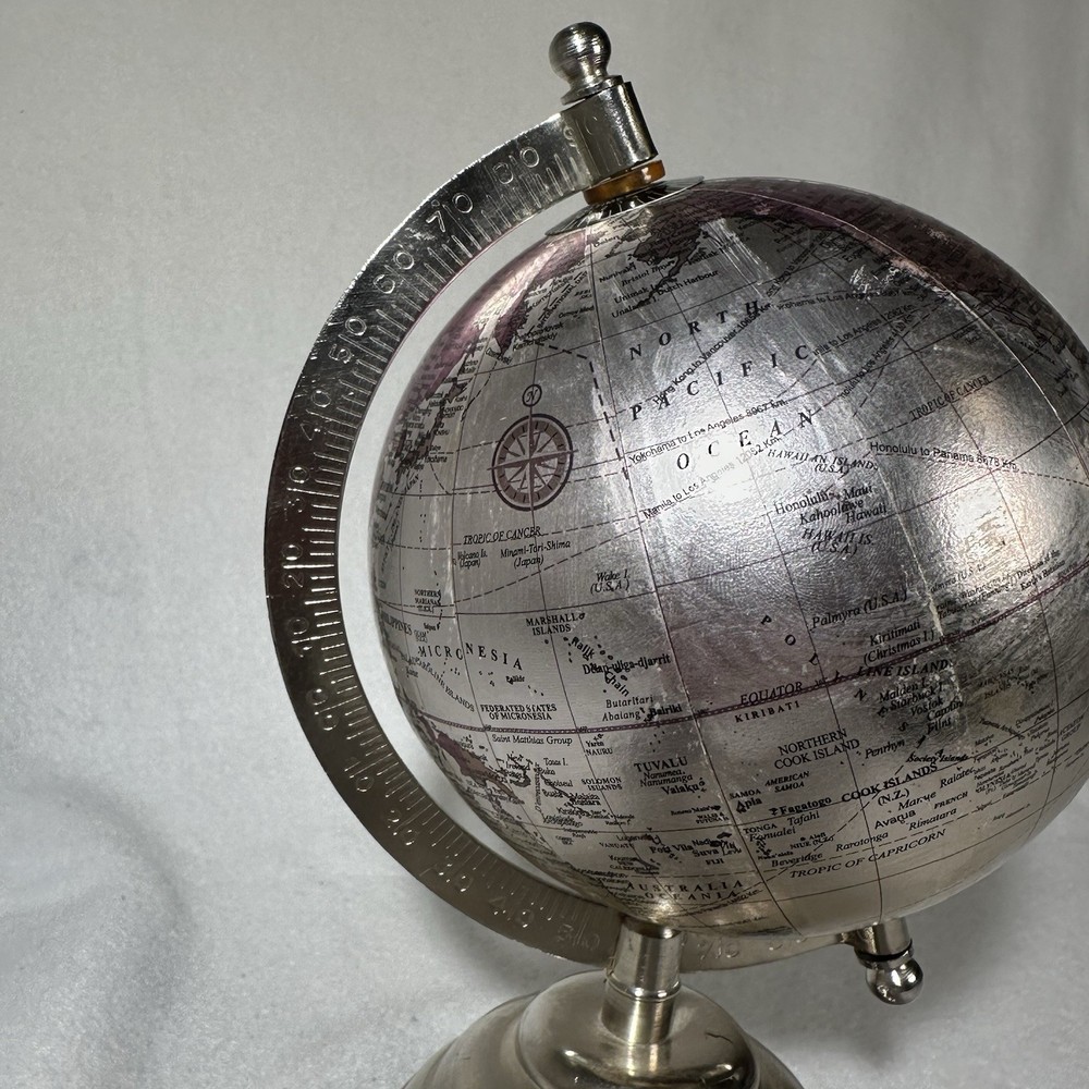 Small 9” Silver Globe Spins On Axis with Base