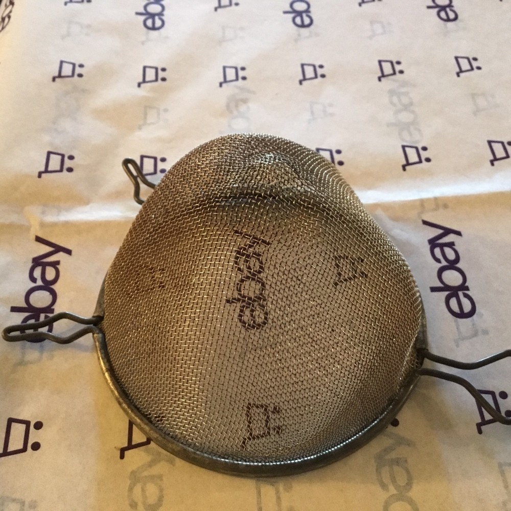 small old metal strainer basket