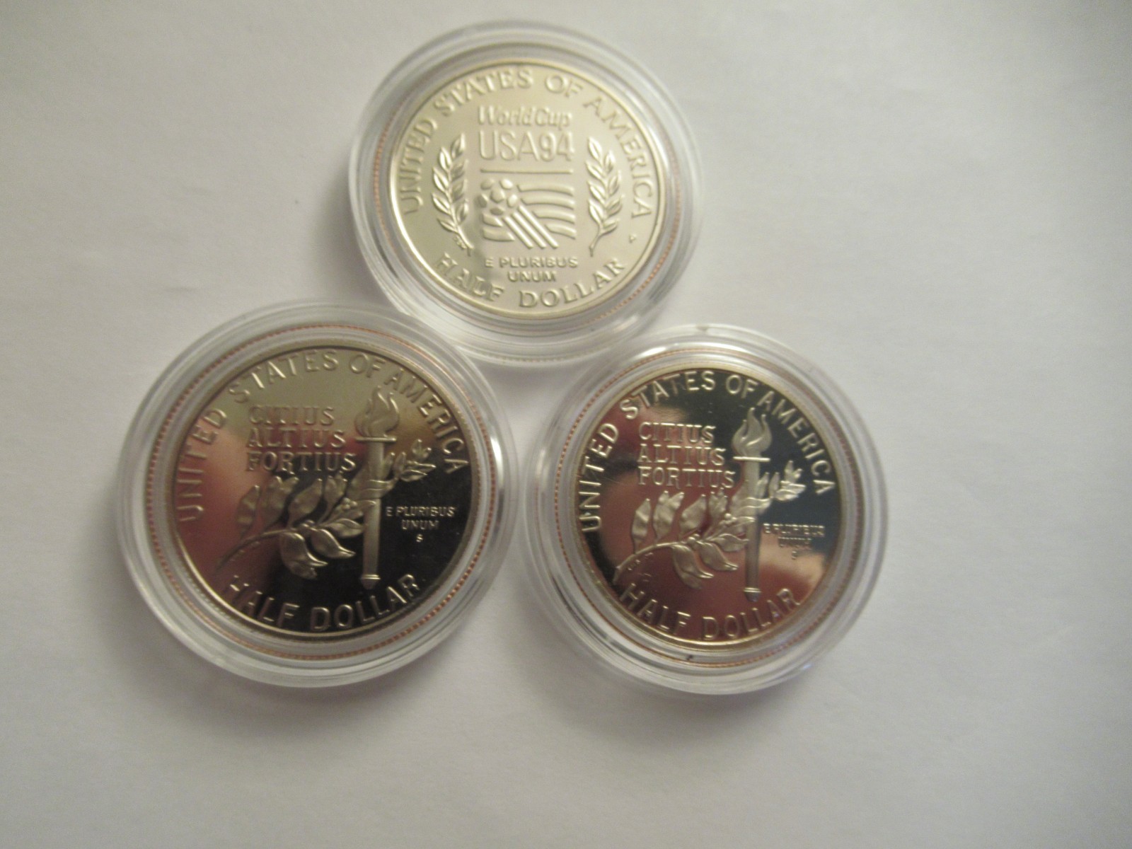 Lot of 11 US Clad half dollars, mix dates, w/ capsules