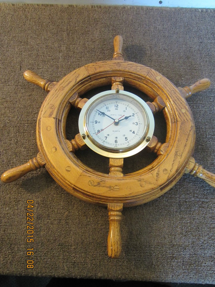 NAUTICAL, OAK SHIP'S WHEEL, WITH BRASS CLOCK