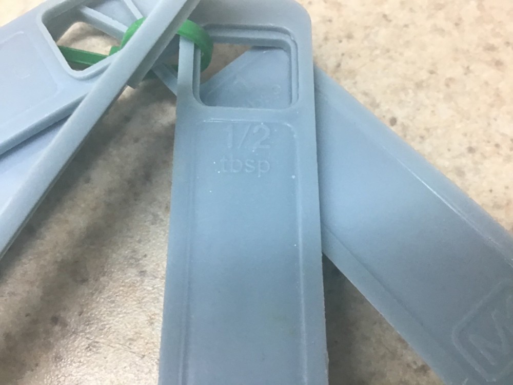 Vintage Unbranded 5 Pc Set Light blue measuring spoons stacking nesting plastic