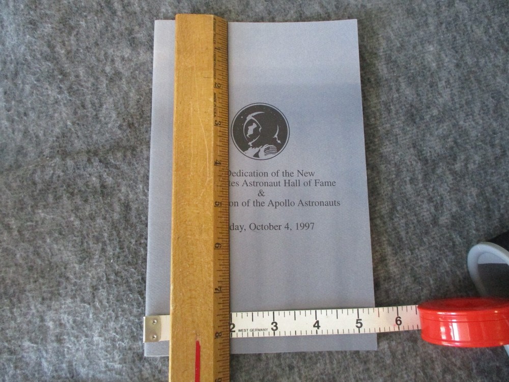 NASA APOLLO ASTRONAUT INDUCTION PROGRAM SIGNED BY WALTER M. SCHIRRA + PEN