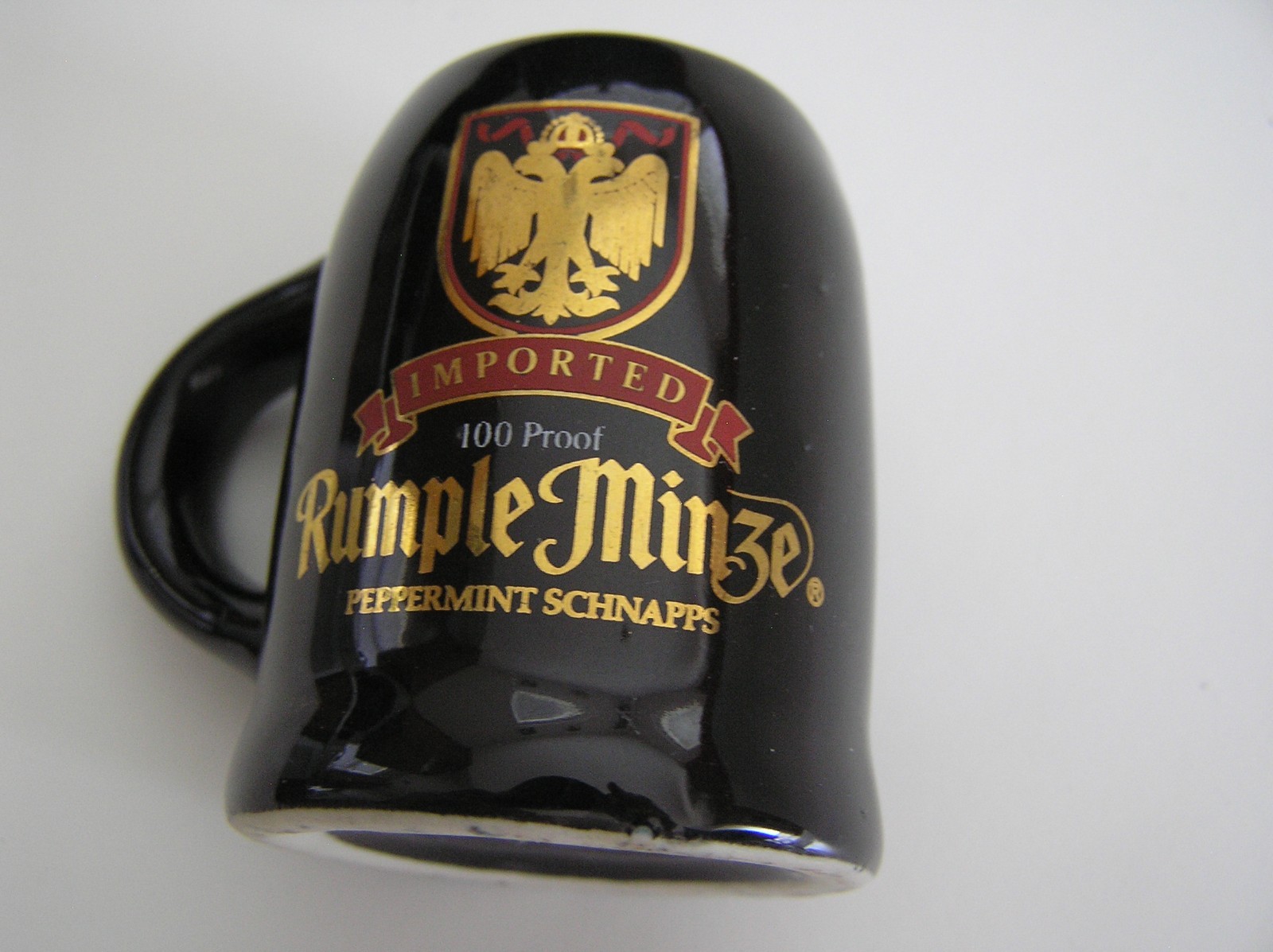 2 Souvenirs Shot Mugs: A Black Rumple Minze and A Clear Nashville 5cents Beer