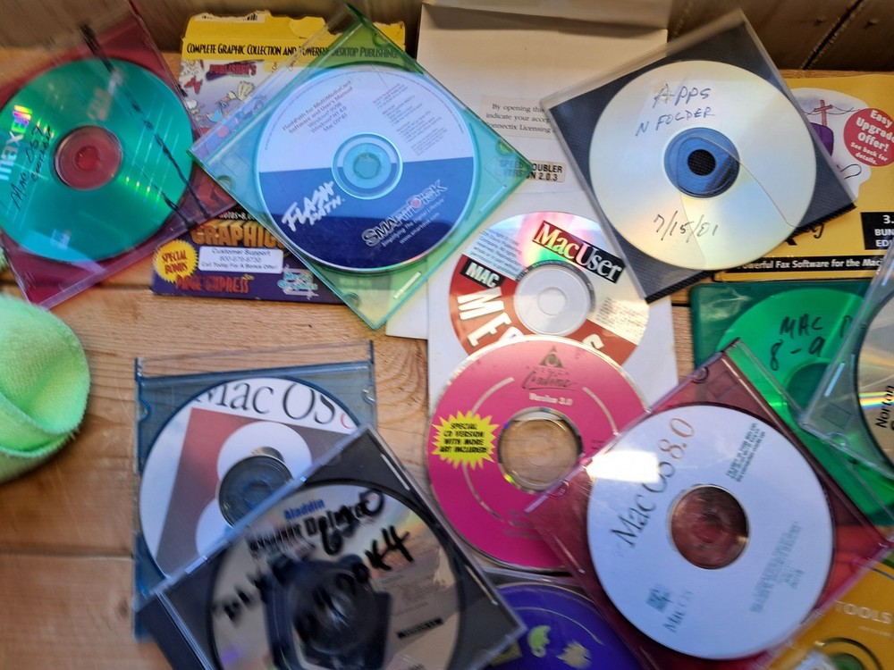40 assorted vintage Mac CD Roms. Mostly from the Power Mac Era.