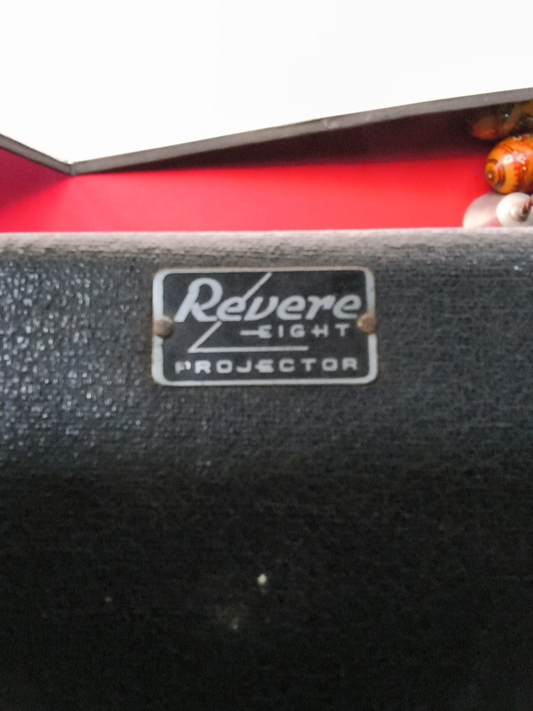 Vintage Revere Eight Model projector With Case, Reel & Cable.