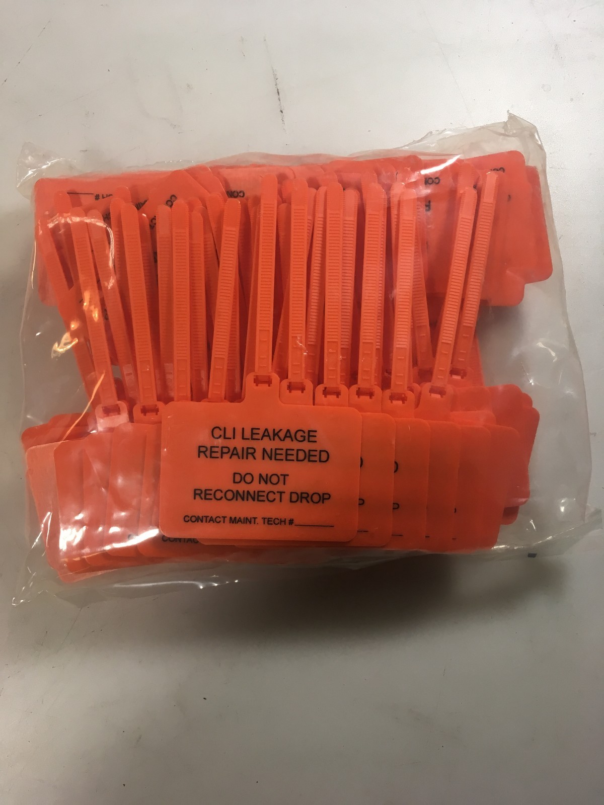 "CLI Leakage Repair Needed" Security Lock out Tags bag of 100