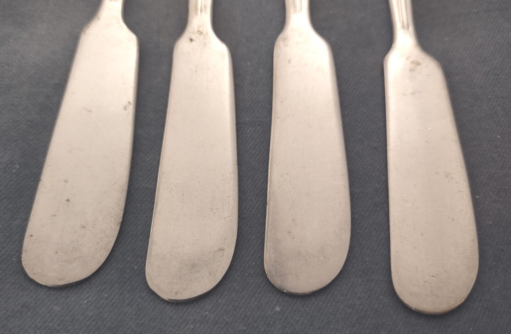 4 Silverplate Butter Spreaders International Silver Camelia pattern