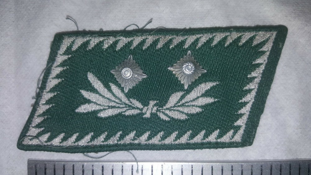 Original axis customs official collar tab