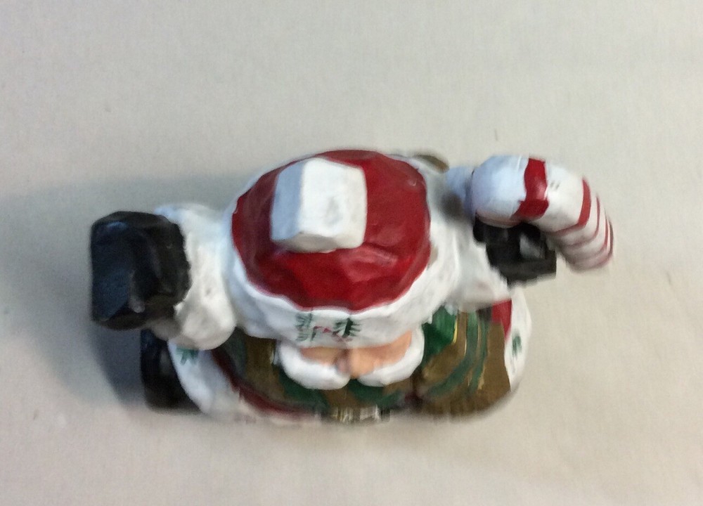 Santa Christmas Vigurine Multi Colored 5” Height.