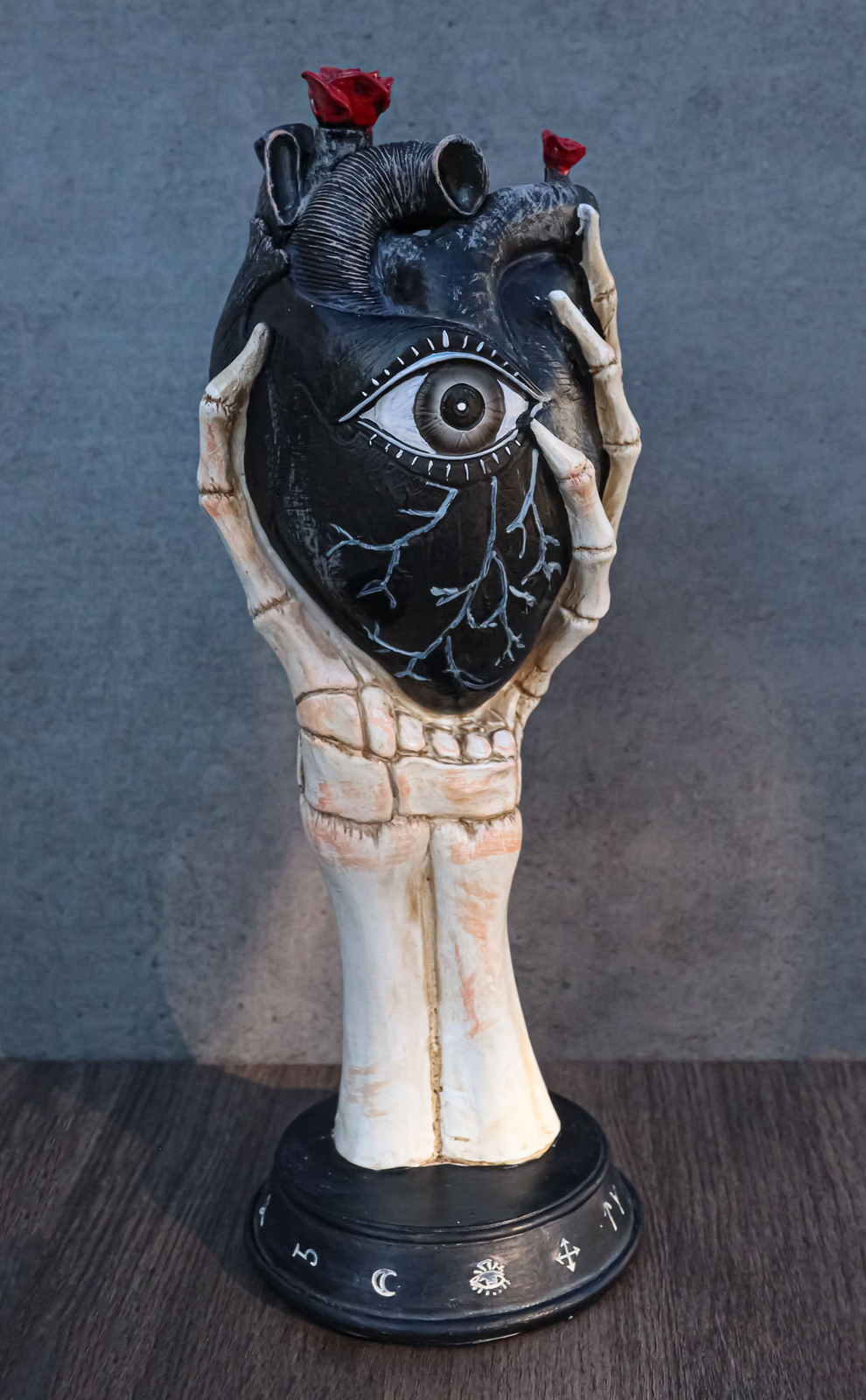 Gothic Alchemy Skeleton Hand Holding Black Anatomy Heart With Evil Eye Figurine