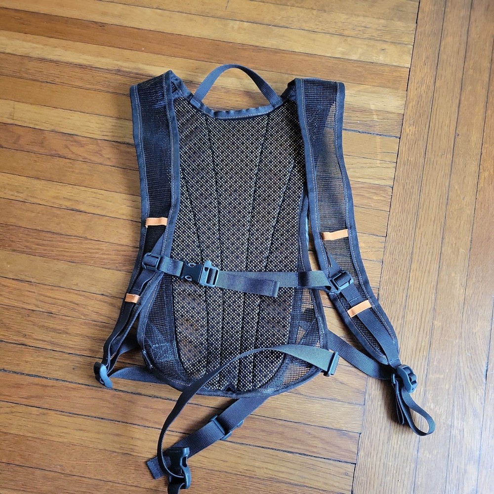 The North Face Flight Series Hydration Pack Orange Gray No Bladder