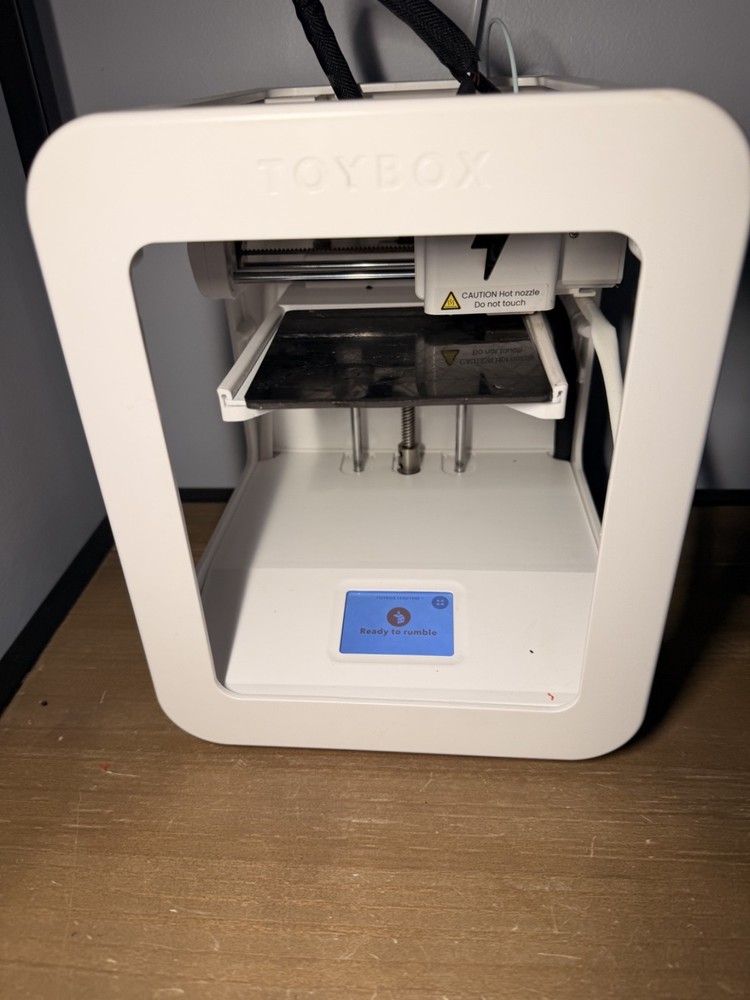 toybox 3d printer alpha 2 with power cable and accessories.