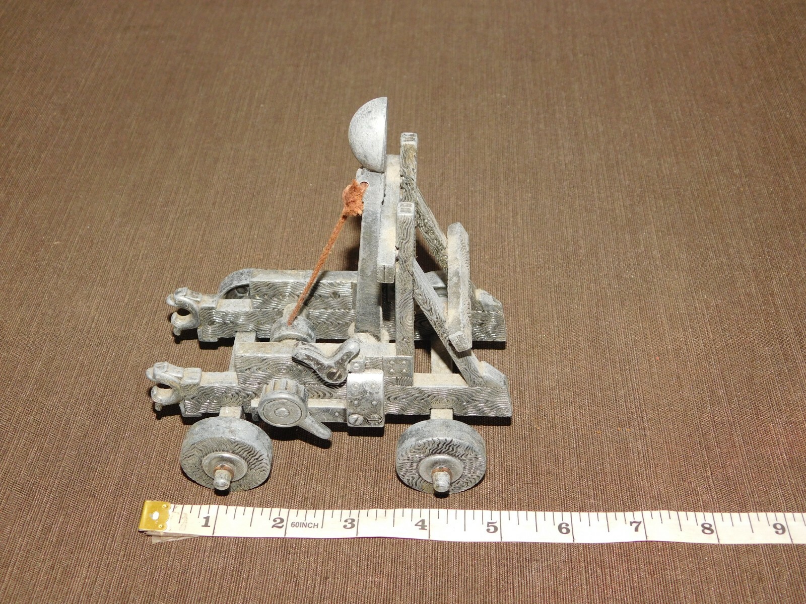 VINTAGE TOY 5" X 4" X 5 1/2" HIGH METAL CATAPULT
