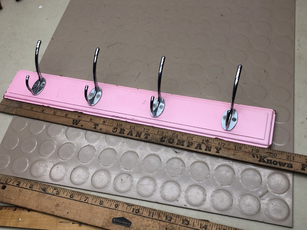 4 Chrome Hooks on Pink Wall Coat Rack