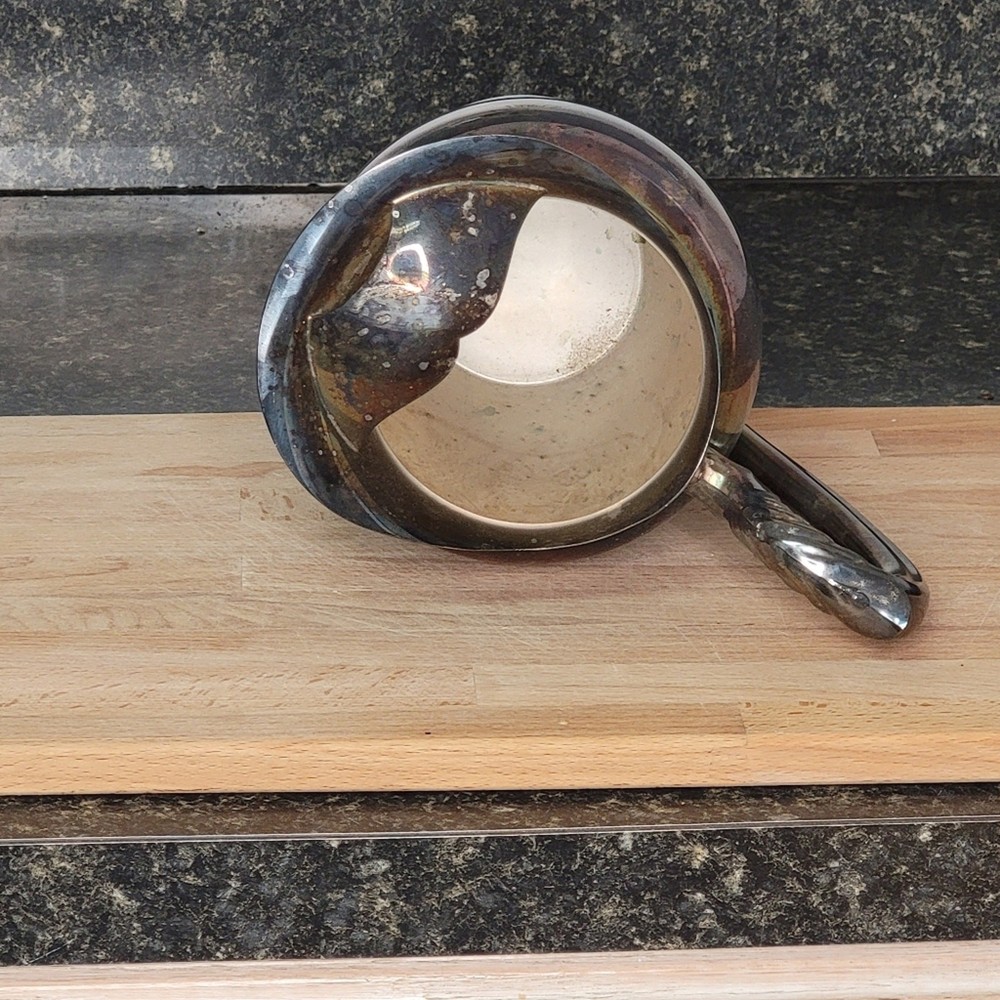 Silver antiqued distressed pitcher