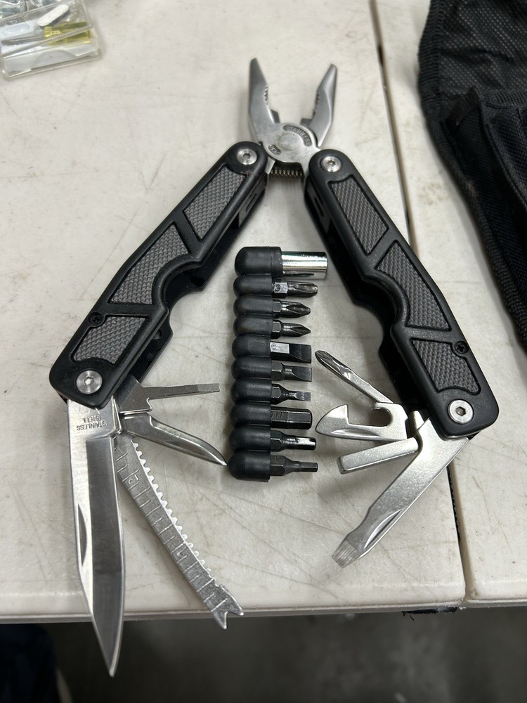 Teracom Components Multi Tool. Knives,saw,leather punch,screwdrivers.
