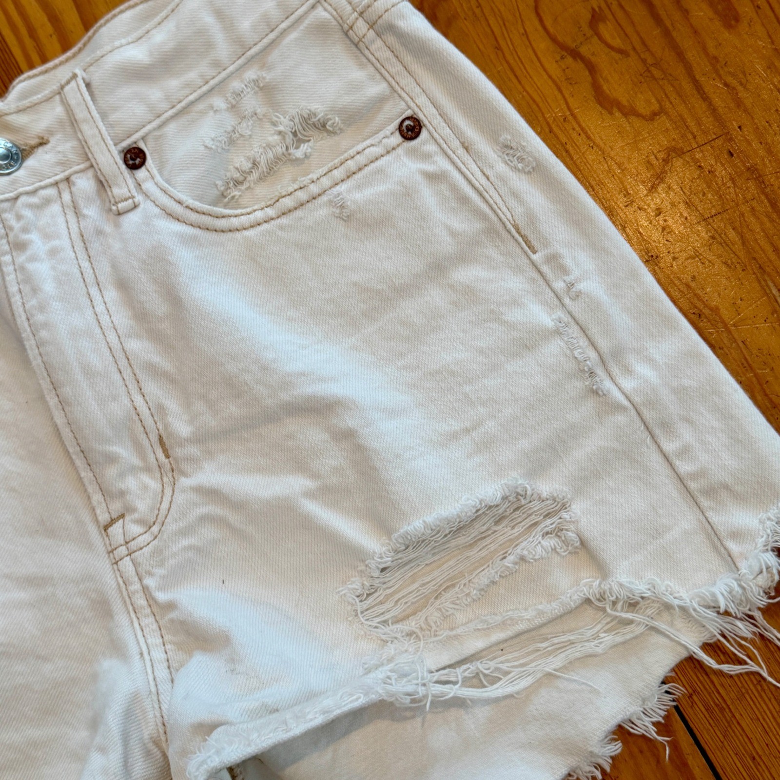 American Eagle White Distressed High Waisted Denim Shorts Size 4 Raw Hem