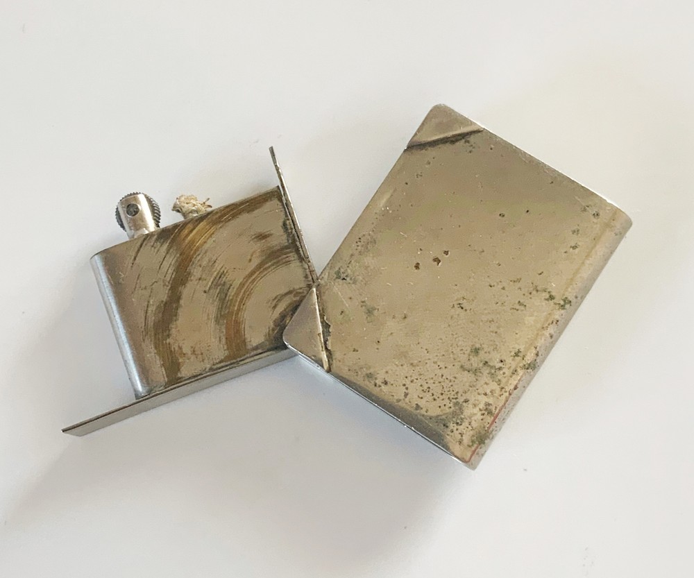 WWII era trench art lighter book