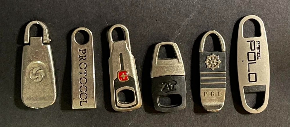 Lot of (6) Assorted Luggage Replacement Zipper Pulls.