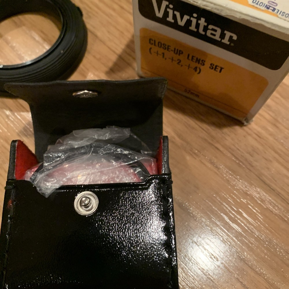 Miscellaneous camera accessories including close-up lens set