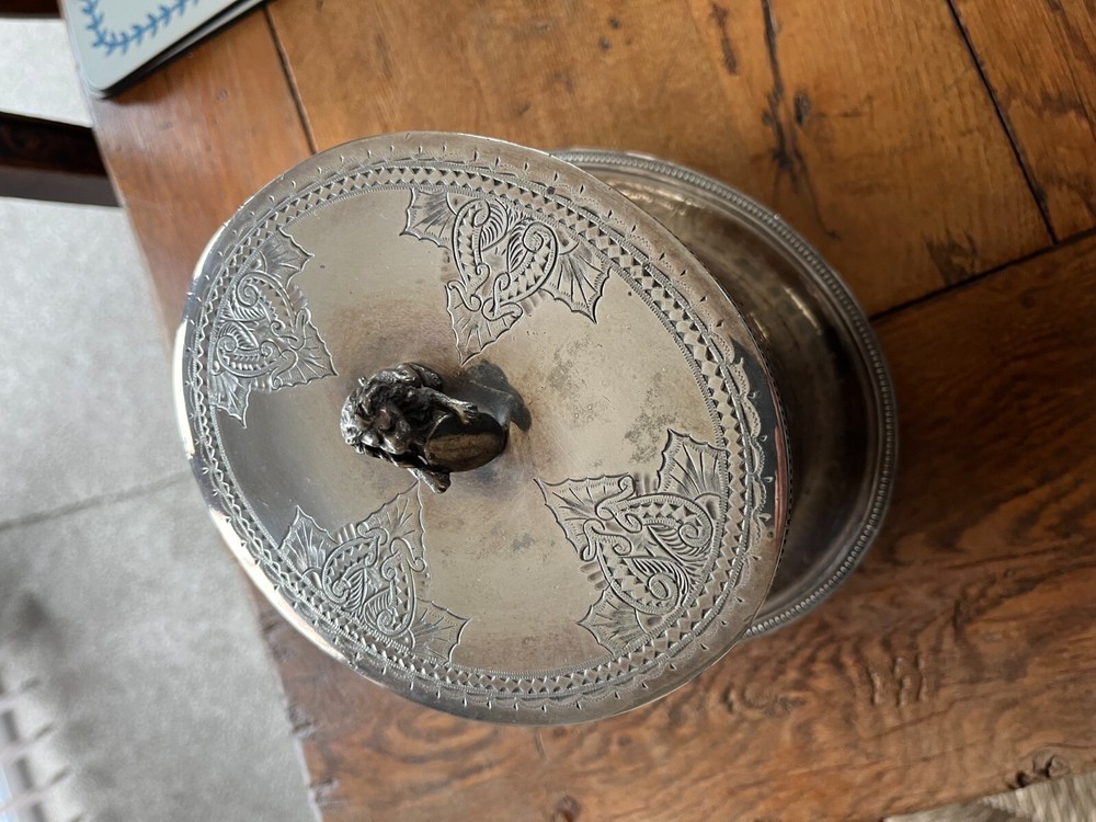antique tea caddy silver plate .lion with shield on the lid