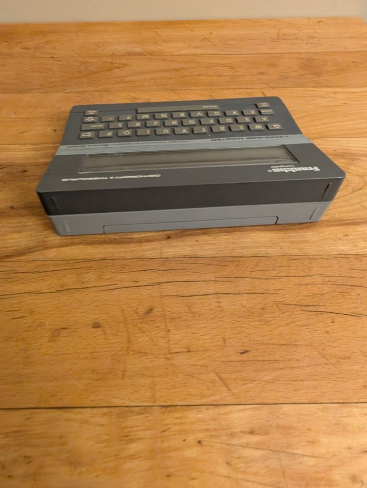 1987 Franklin Computer Dictionary Thesaurus LM-2000 Language Master Works