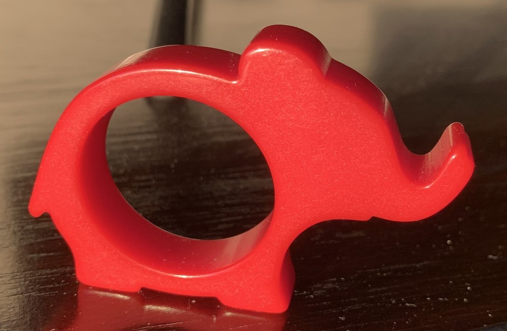 Bakelite Red Elephant Napkin Ring. Approx 3" wide.