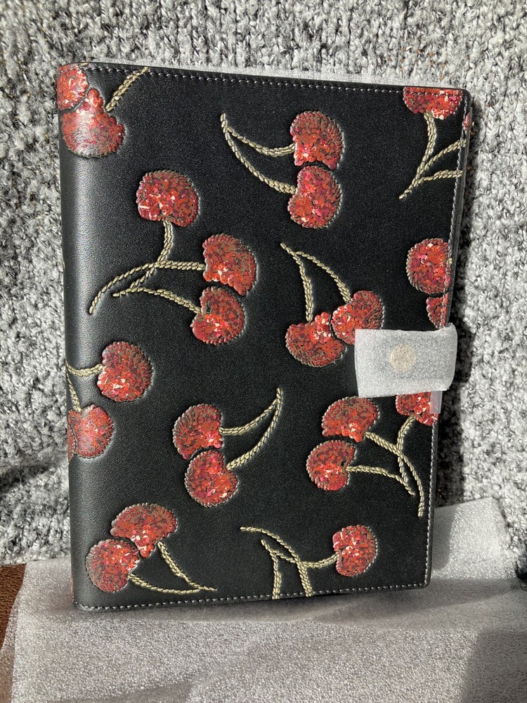 NWT Coach Notebook Cherry with gold/black multi 100% authentic. Purchased direct