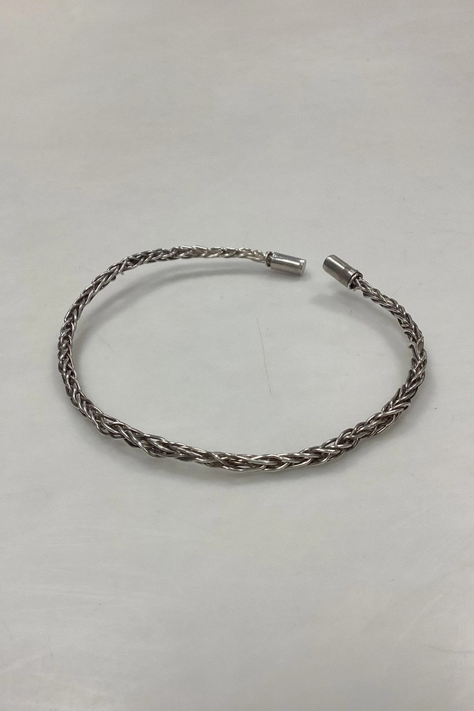 Modern Open Braided Open Neck Ring in Sterling Silver